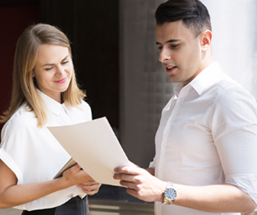 Man and woman looking at a quote